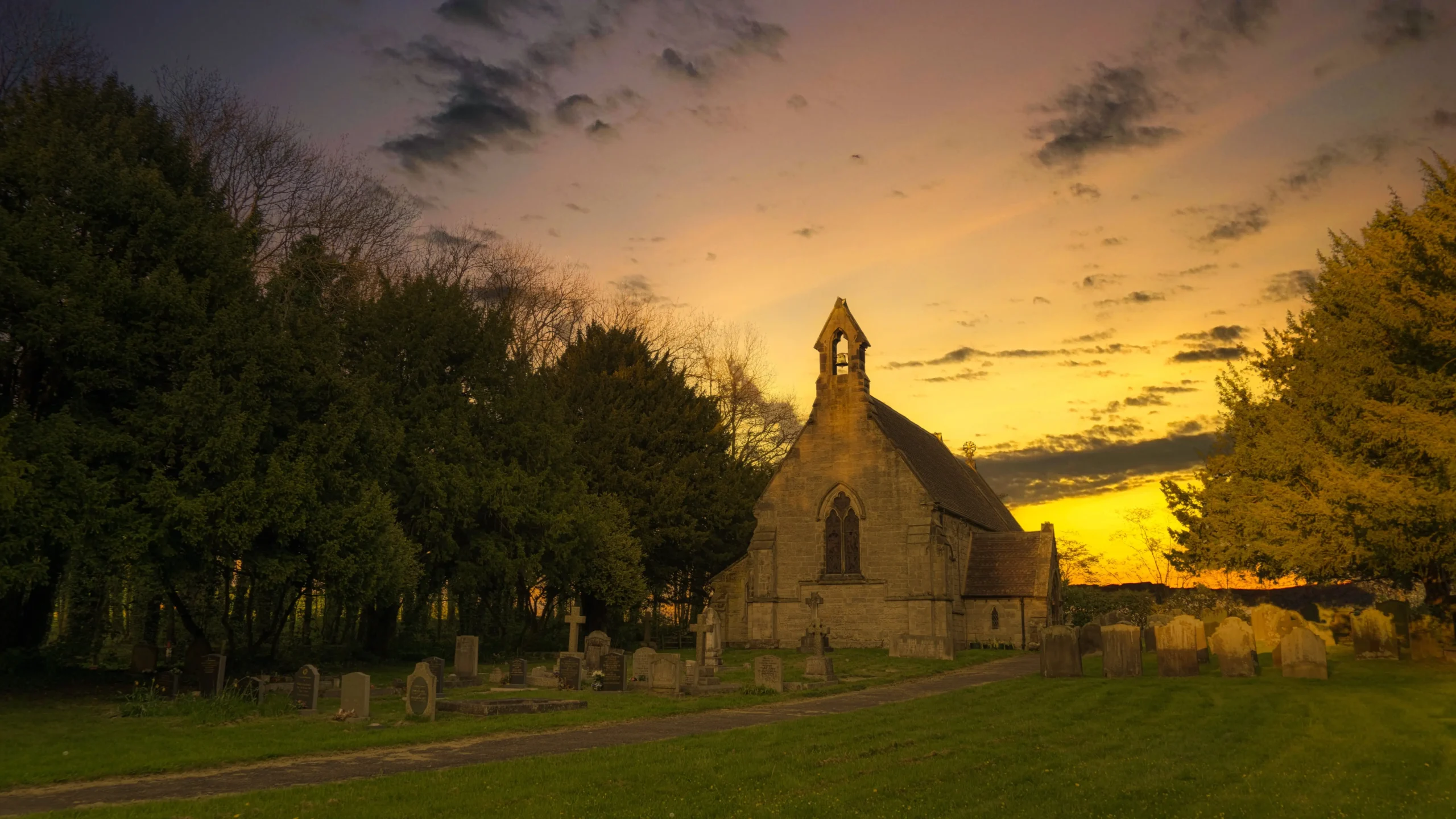 brown-black-concrete-church-cloudy-sky-daytime-min